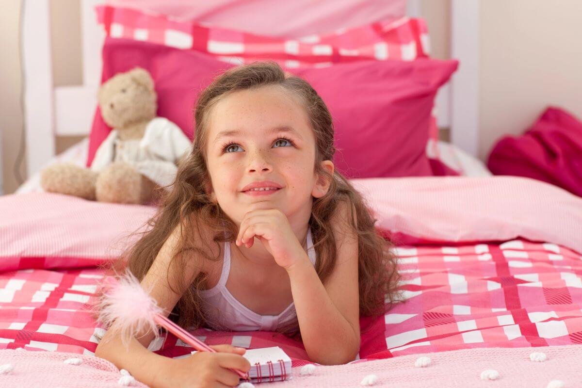 Small Double Beds for Kids and Teens: The Smart UK Bedroom Upgrade 1 little girl lying on bed